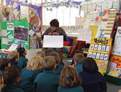 image of classroom and teacher teaching. 