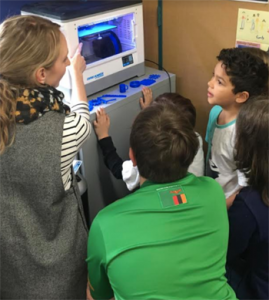 Teacher and students - 3D printing.